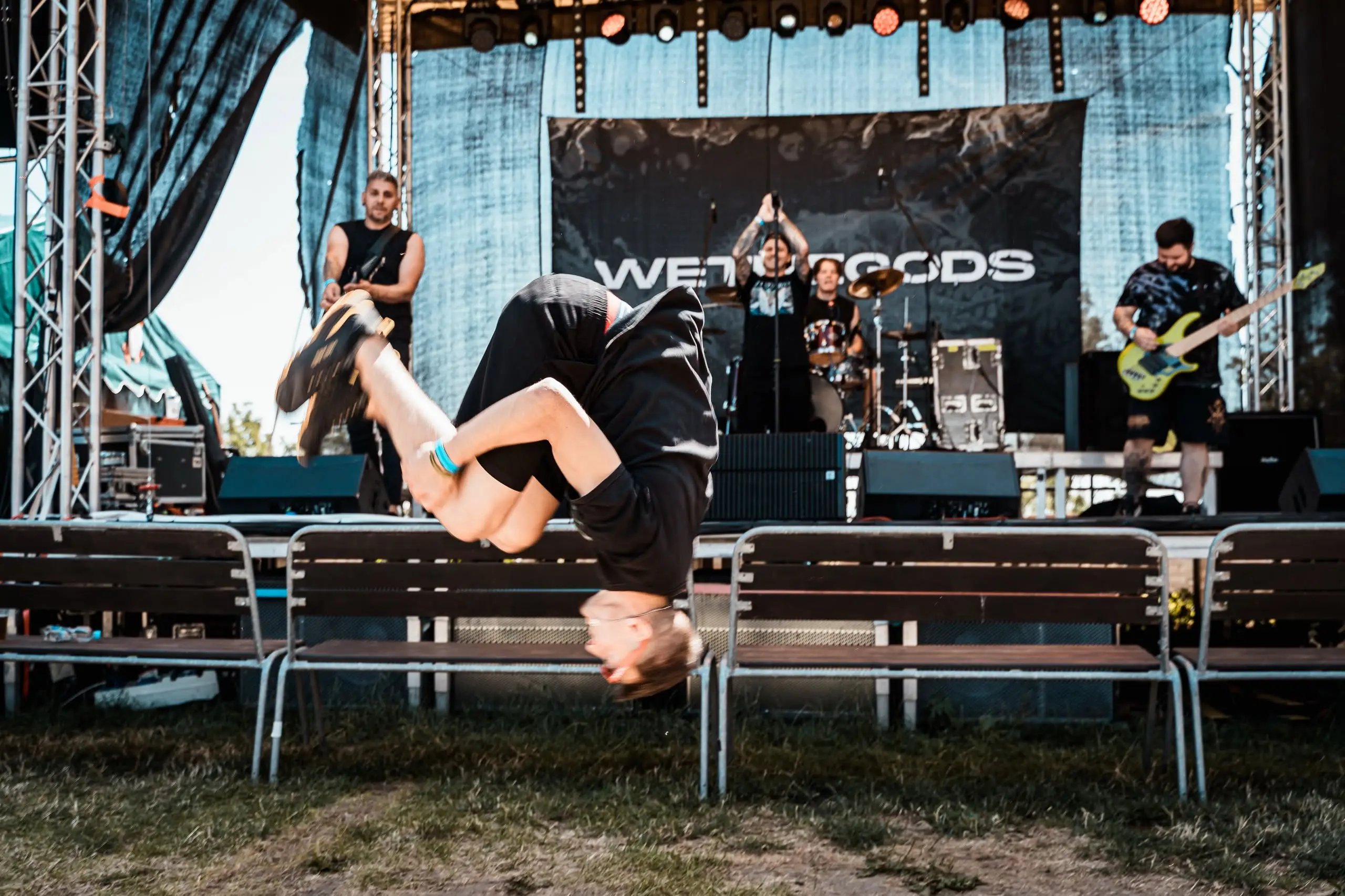 A fan doing a backflip in front of the stage, Front Line Fest 2026