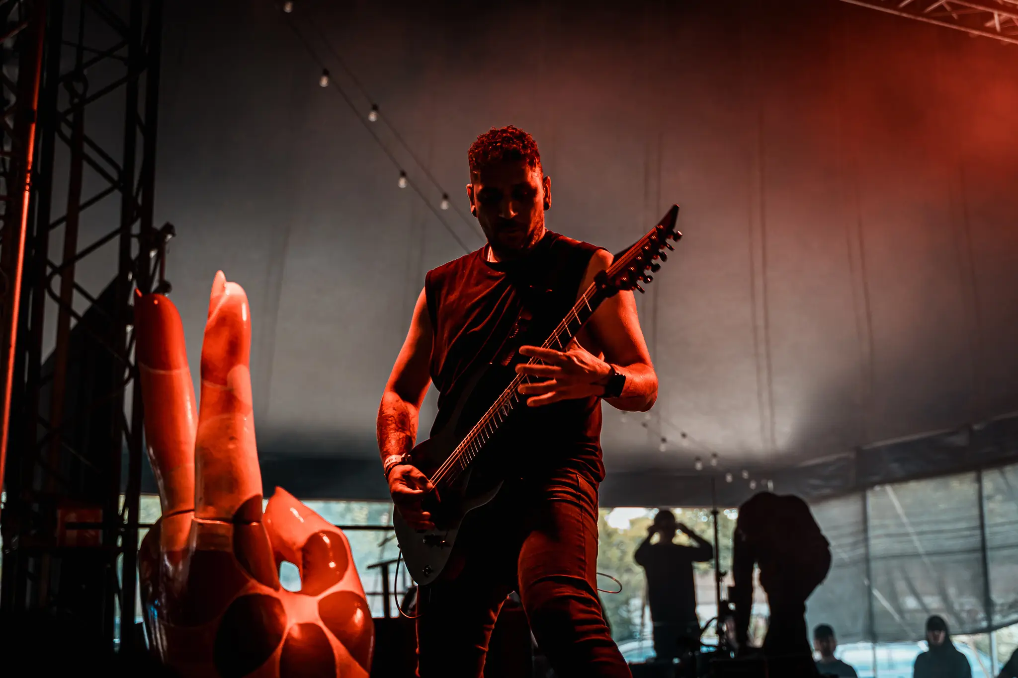 Guitarist playing in the festival tent