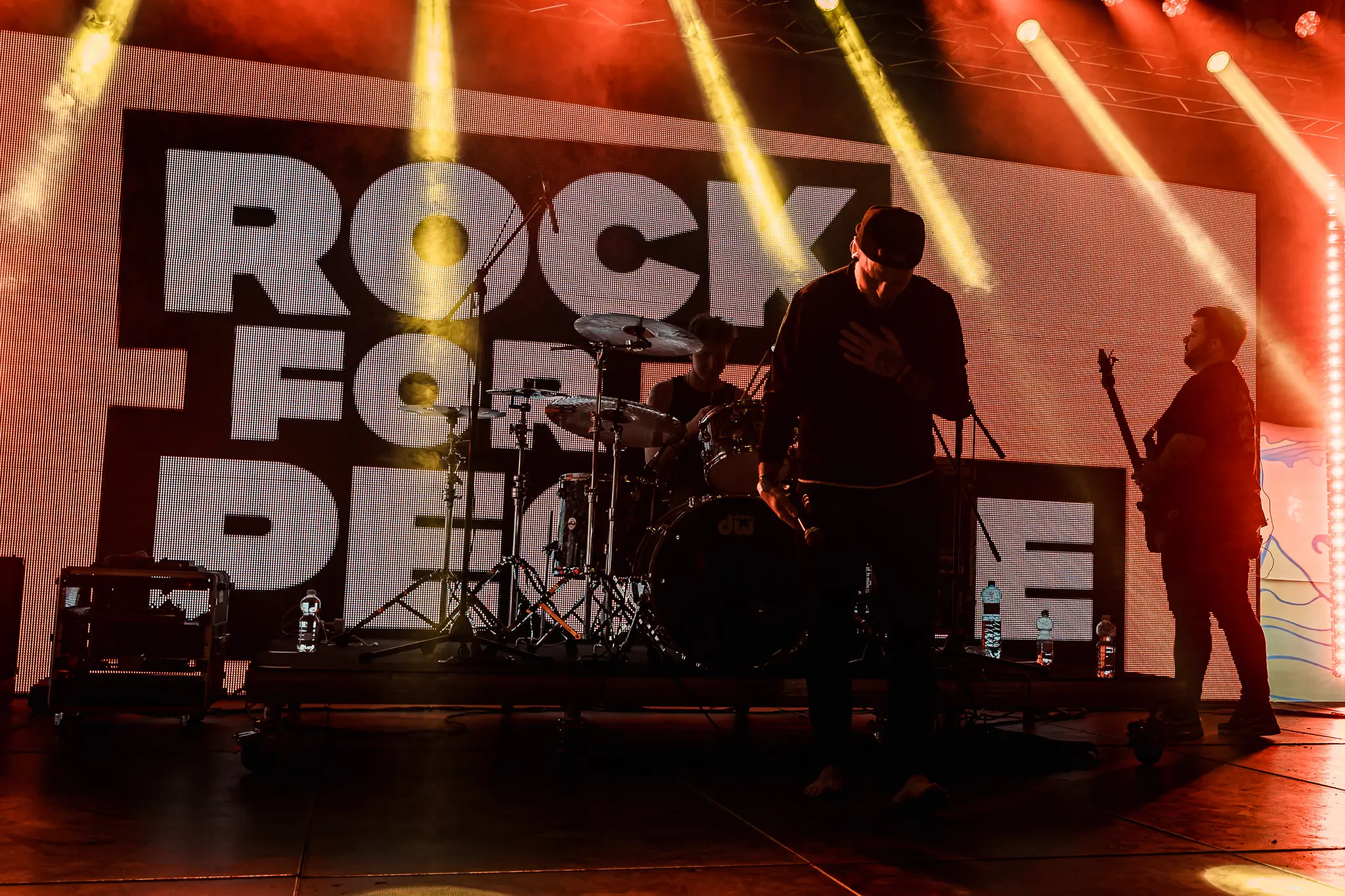 Wide shot of the stage in front of the Rock for People screen
